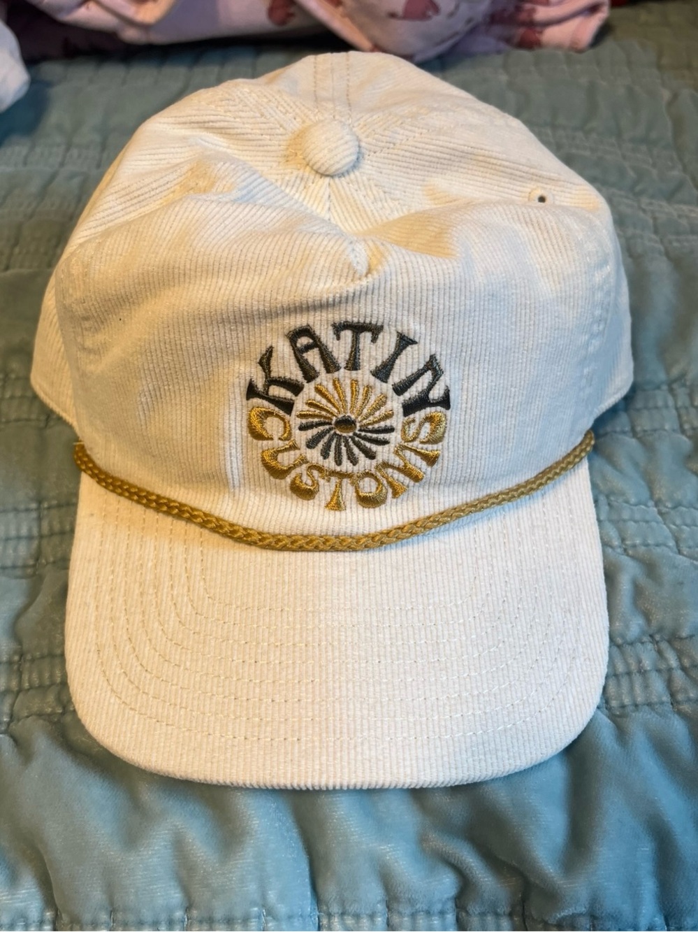 Katin Cream Corduroy Rope-Trim Hat with Gold Embroidery